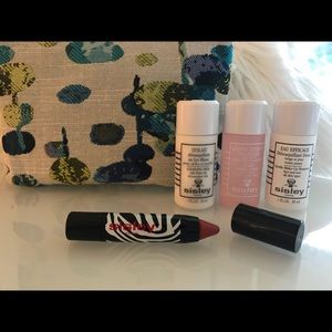 Sisley makeup bag with travel size items